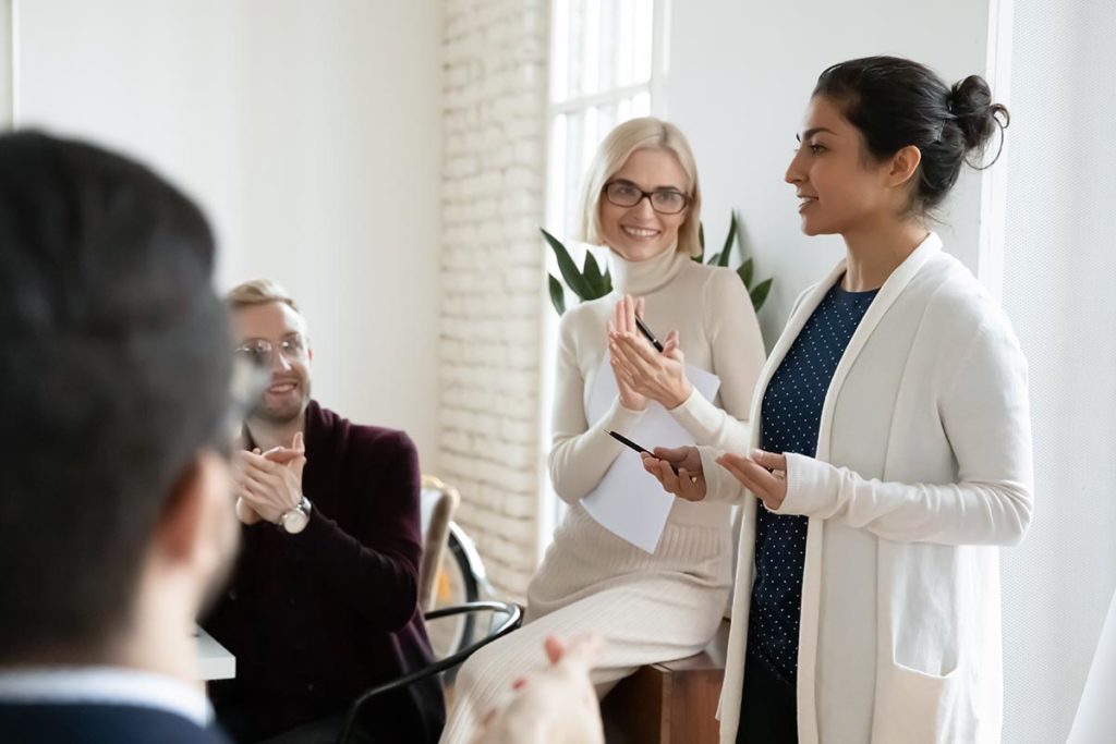 people-in-a-meeting-discussing-financial-coaching