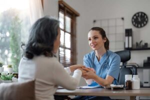 a woman gets help understanding her insurance coverage for sober living