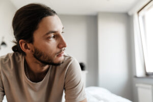 a man struggles with his mental health in early sobriety